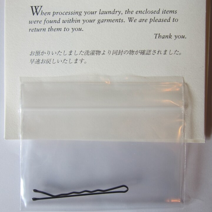 A bobby pin returned with a note from the laundry